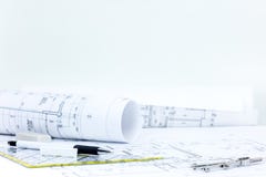 Drawing and measuring tools, blueprint rolls on architect workpl Stock Photography Drawing and measuring tools, blueprint rolls on architect workpl Stock Photography